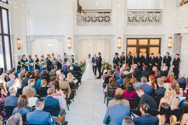 Wondering where to set up your ceremony? Our 2 most popular choices are in front of the marble & drapes, or in front of the vault! For a longer aisle, opt for the drapes. If you want a wider seating arrangement, the vault is the perfect option

Photo 1: Photography @jonaleeearles Planning @arrowbellaweddings
Photo 2: Photography: @barbaraophotography

#citizensballroom #marylandweddingvenue #marylandwedding #dmvwedding #historicweddingvenue #2025wedding #weddingtrends #pinterestwedding #2025bride #2025weddingtrends
