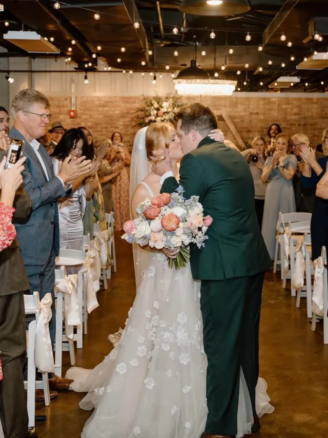 Our biggest wedding rec is to pause halfway down the aisle for another kiss!! It’s the perfect mix of loved ones cheering you on while you’re at the center of it all 🤍

Photography willowrootsphotography
Coordinator @atthealtar_llc 
Band @partygirlentertainment 
Cocktails @greeneolivescatering
Florals @houndhillflowers 
HMUA @brushedbeautyllc_ 
Catering @missionbbq 
Couple @thorsey17 & @carlyjveale 

#mainstreetballroom #marylandweddingvenue #marylandwedding #dmvwedding #historicweddingvenue #2025wedding #weddingtrends #pinterestwedding #outdoorweddingvenue #weddingtips