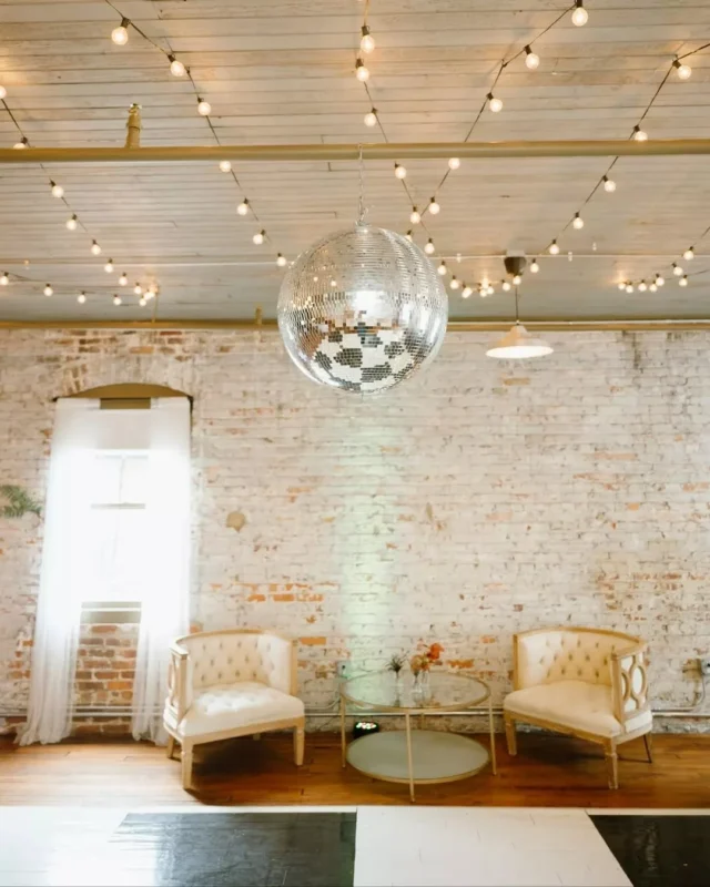 A checkered floor, a disco ball, and a room full of personality🪩✨ The Brick Hall @savannahbottleworks is all about possibilities—and this setup brought them all to life.

Venue: @savannahbottleworks @fetewell
Photography: @ashleecphotography
Planner: @savannahmagoliaevents
Videography: @ardsleyparkproductions
Florals: @peachykeeneflowerfarm
Beauty: @bridalbywonderland_beautybar
Desserts: @grinsandgigglescookieco
DJ + Photo Booth: @allaboutyouentertainment
Rentals: @mccoyseventprofessionals
Hotel: @theannsavannah

Savannah Bottle Works | Fetewell | Historic Wedding Venue | Georgia Wedding #weddinginspiration #savannahwedding #savannahweddingvenue #fetewellvenue #weddingreception #weddingplanning