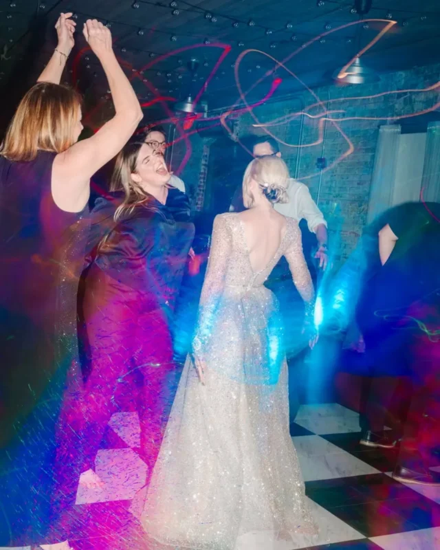 Bright lights. Big moves. Endless energy.

The vibes? Iconic🕺✨

Venue: @savannahbottleworks @fetewell
Photographer: autumncphoto
Hair: @maladroitvixen @chredmar
Dress: @sweetelegancebridal
Bride: @lapin_studios