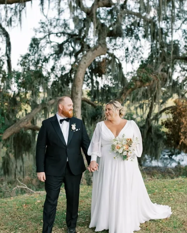 Framed by the oaks.

Minimal effort, maximum romance. Savannah’s natural backdrop doing what it does best🤍

Reception venue: @savannahbottleworks @fetewell
Ceremony venue: @bethesdaacademyweddings
Photographer: @mariannelucille
Planner: @spectacularsaturdaysweddings
Content creator: @bffofthebride
Hotel: @perrylanehotel
Hair: @enchantedsalonsav
Florals: @graceandthornsav
Bridal dress: @lovecurvybridal
Tux: @theblacktux
Bridesmaid dresses: @jadorebridal
Officiant: @reverendjoewadas
Trolley: @kellytours
Rentals: @eventworksrentals
DJ: @allaboutyouentertainment