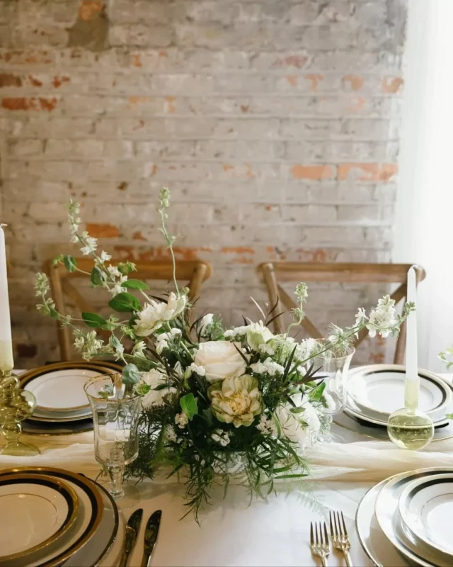 There is a timeless confidence in a palette of cream and black. By layering in textural florals and the warmth of gold accents, the design feels grounded yet celebratory.

A reception design like this is about more than just a beautiful table—it’s about setting the stage for a long, intentional evening of conversation. 

Venue: @savannahbottleworks @fetewell
Photography: @ashleecphotography
Planner: @savannahmagoliaevents
Videography: @ardsleyparkproductions
Florals: @peachykeeneflowerfarm
Beauty: @bridalbywonderland_beautybar
Desserts: @grinsandgigglescookieco
DJ + Photo Booth: @allaboutyouentertainment
Rentals: @mccoyseventprofessionals
Hotel: @theannsavannah