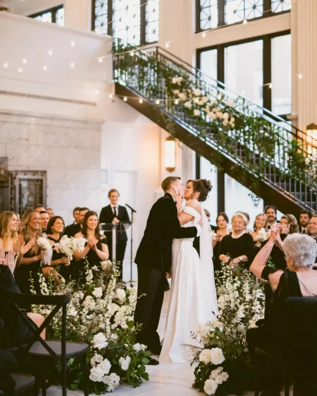 Breaking away from the traditional aisle 🕊️

A circular ceremony is our favorite way to reimagine the ballroom. It creates an entirely immersive experience that trades the long walk for a 360-degree moment—letting the history of the room wrap around you and your people.

A beautiful reminder that at the heart of the celebration is the community surrounding it.

Venue - @citizensballroom
Catering / Bar - @simplyfreshevents
Baker - @sagecakery
Photography - @milkshopphoto
Florist - @steelcutflowerco
Band - @thebluetips
Hair & Makeup - @vintageveils
Transportation - @onthetownlimos
Hotel - @hamptoninn_frederick
Invites - @theknot
Dress - @lovecouturebridal
Tux - @nordstrom

maryland wedding venue. 2027 wedding ideas. wedding ceremony. frederick maryland. historic wedding venue. citizens ballroom.