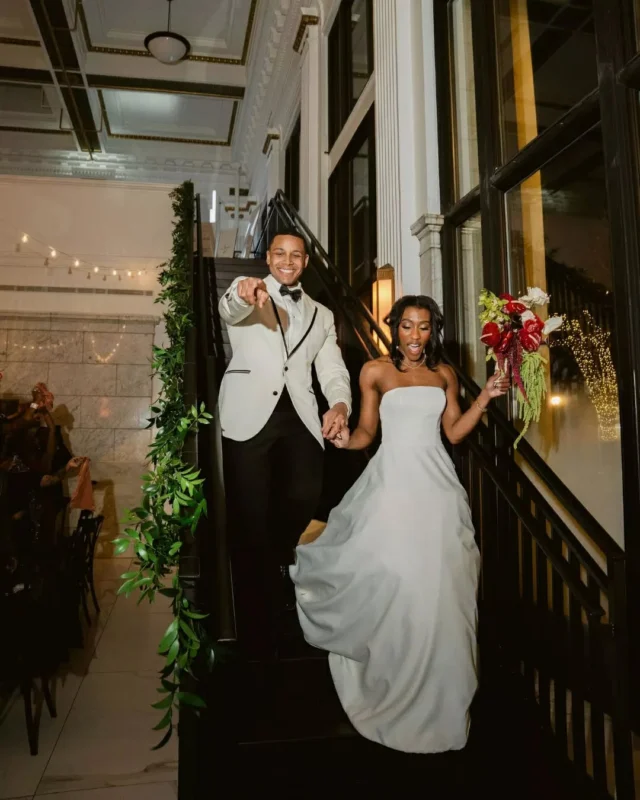 Grand architectural lines meet the energy of a high energy reception. We love seeing @citizensballroom transform from a polished dinner setting into the ultimate party. From that first entrance as newlyweds under the mezzanine to a packed dance floor at midnight, the atmosphere is always unmatched.

Coordination - @dmvweddingsandevents
Venue - @citizensballroom @fetewell
Photography - @momentsbymoy
DJ - @chrisstylesevents
Saxophone - @liamhurlbutmusic
Catering - @cravecateringco
Florals - @bloomingblossoms.co
Decor - @savvycustomswag

frederick maryland. md bride. maryland wedding venue. historic wedding venue. 2027 wedding ideas.