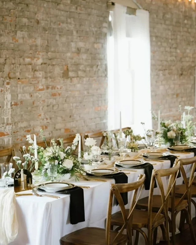 There is a striking balance that happens when a sleek, black-and-white palette meets the raw texture of historic brick.

In the Brick Hall, the simplicity of a monochrome table design allows the architecture to speak for itself. It’s a reminder that sometimes the most modern statements are the ones that lean into the history of the room.

Venue: @savannahbottleworks @fetewell
Photography: @ashleecphotography
Planner: @savannahmagoliaevents
Videography: @ardsleyparkproductions
Florals: @peachykeeneflowerfarm
Beauty: @bridalbywonderland_beautybar
Desserts: @grinsandgigglescookieco
DJ + Photo Booth: @allaboutyouentertainment
Rentals: @mccoyseventprofessionals
Hotel: @theannsavannah

#savannahbottleworks #savannahgeorgia #savannahwedding #georgiawedding