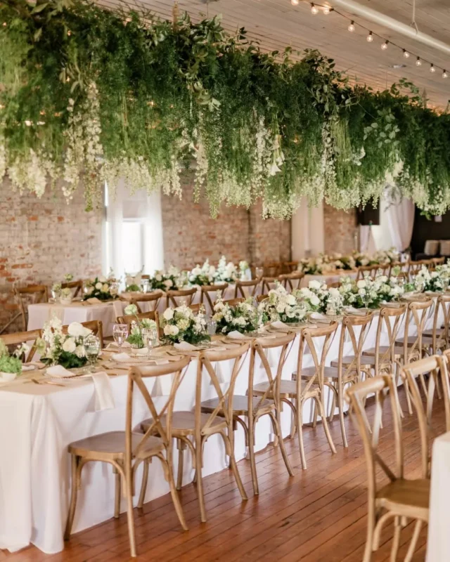 Kristie + Jared wanted a garden, and @peachykeeneflowerfarm made it happen 🌿

Greenery cascading from above, white roses threaded through every table, and a neutral palette that let it all breathe. The Brick Hall has never felt more alive.

This is what we mean when we say this space takes on a completely different life with the right vision behind it.

Photography: @taylorbrownphoto
Assistant photographer: @tamera_with_a_camera
Ceremony Venue: @cathedral_savannah
Beauty: @nabiabeauty
Florals: @peachykeeneflowerfarm
Reception Venue: @savannahbottleworks @fetewell 
Dessert: @grinsandgigglescookieco
Dress: @ivoryandbeau

savannah wedding venue. 2027 bride. georgia wedding planning. savannah historic district. georgia wedding venue. lowcountry wedding.